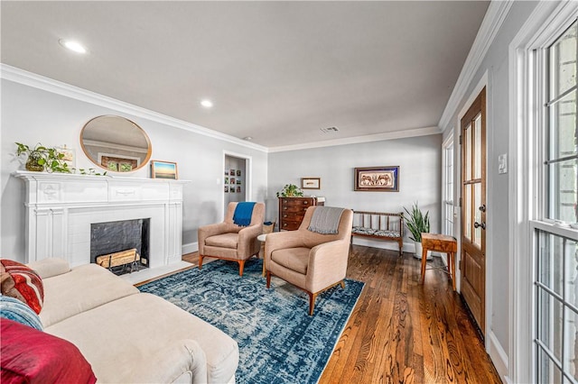 living room with dark hardwood / wood-style flooring, crown molding, and french doors