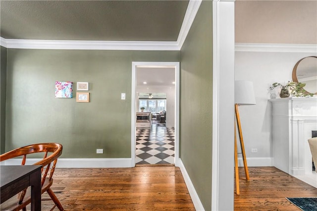 corridor featuring hardwood / wood-style floors and crown molding