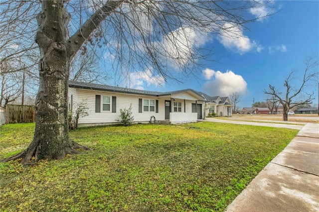 ranch-style house with a front yard