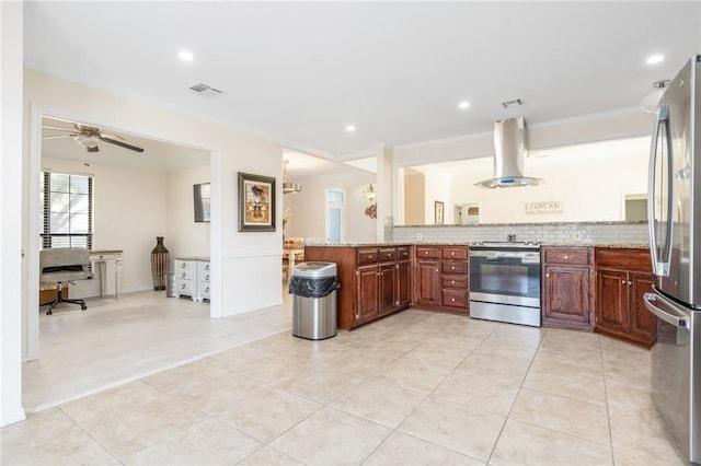 kitchen with backsplash, light stone countertops, appliances with stainless steel finishes, island range hood, and kitchen peninsula