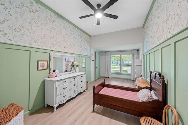 bedroom with ceiling fan and light wood-type flooring