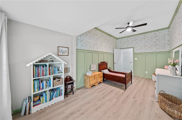 living area with ceiling fan and light hardwood / wood-style floors