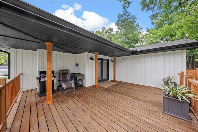 wooden terrace with area for grilling