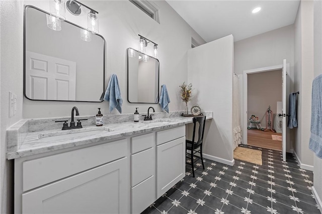 bathroom featuring vanity