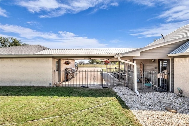 exterior space featuring a carport