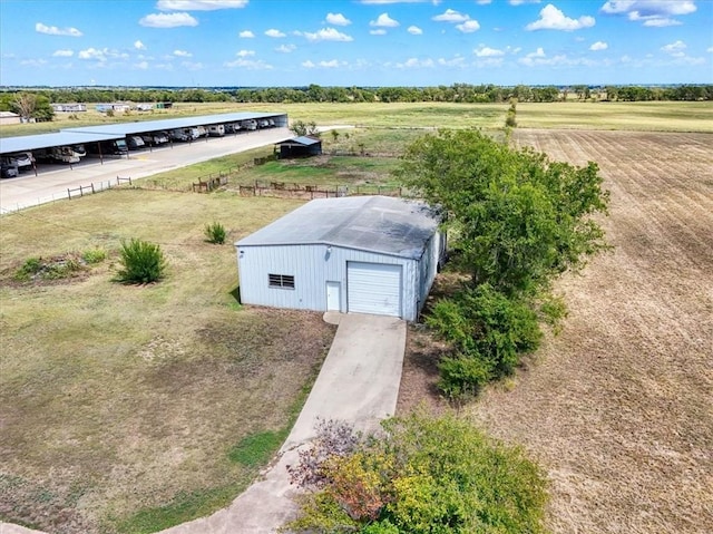 birds eye view of property featuring a rural view