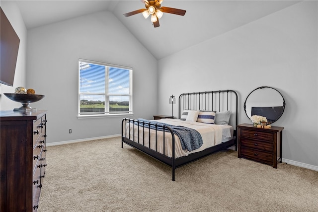 bedroom with a ceiling fan, light colored carpet, and baseboards