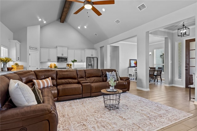 living area featuring high vaulted ceiling, visible vents, light wood-style floors, and beam ceiling