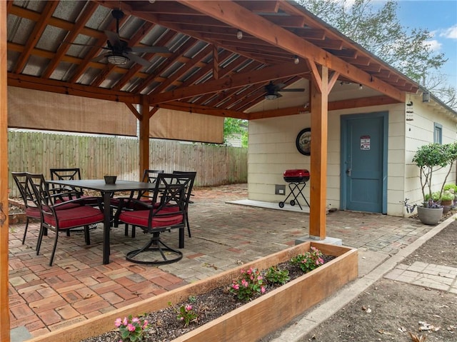 view of patio / terrace featuring a gazebo and ceiling fan