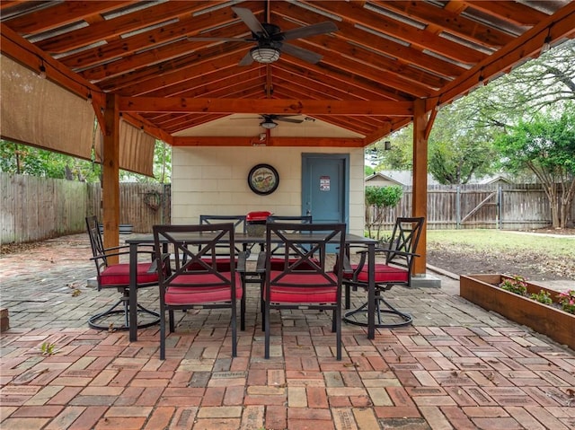 view of patio featuring ceiling fan