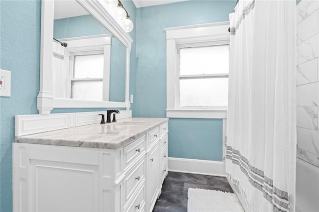 bathroom featuring vanity and shower / tub combo