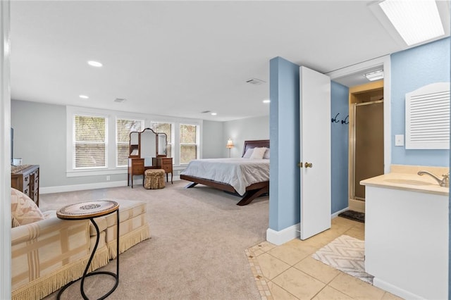 carpeted bedroom with sink