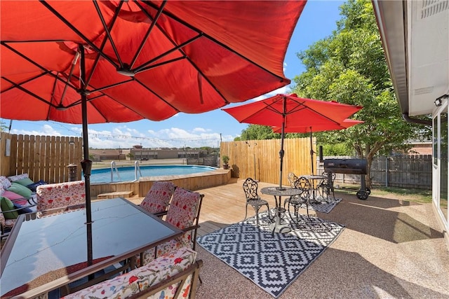 view of patio / terrace featuring a swimming pool side deck