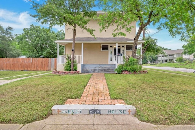 view of front of house featuring a porch and a front lawn