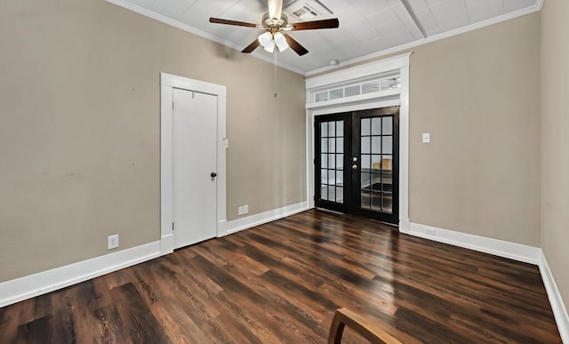 empty room featuring ceiling fan, dark hardwood / wood-style flooring, ornamental molding, and french doors