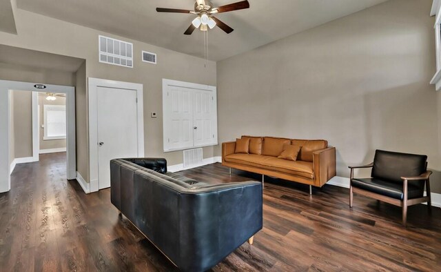 entrance foyer featuring ceiling fan and dark wood-type flooring