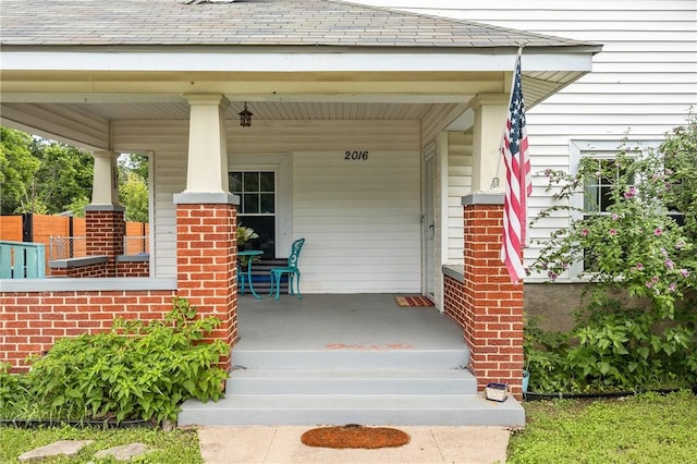 property entrance with a porch