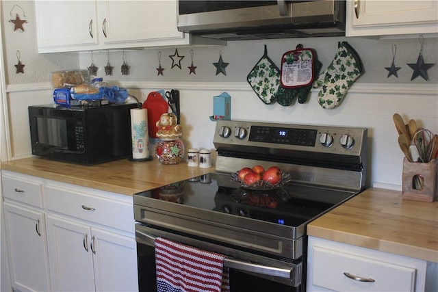 kitchen with white cabinetry and stainless steel range with electric cooktop