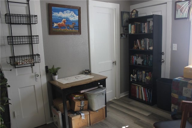 office area with hardwood / wood-style flooring