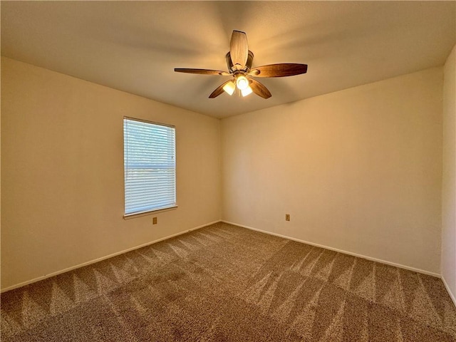 unfurnished room featuring carpet floors and ceiling fan