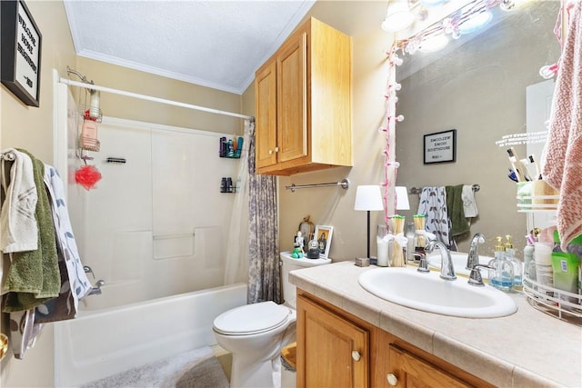 bathroom with toilet, ornamental molding, shower / bath combo with shower curtain, a textured ceiling, and vanity