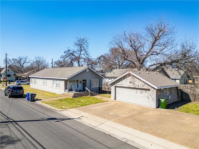 ranch-style house with a garage, a shingled roof, a residential view, a porch, and a front lawn