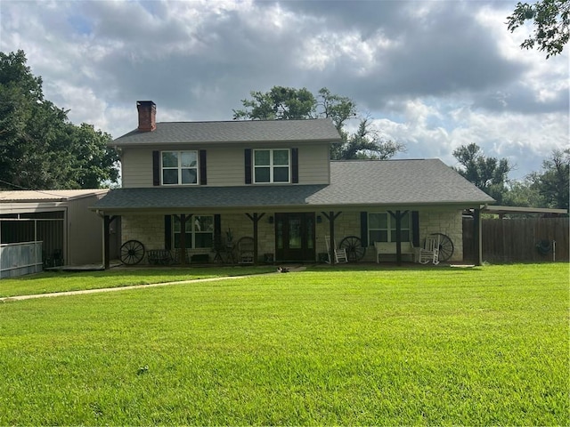 view of front of home with a front lawn