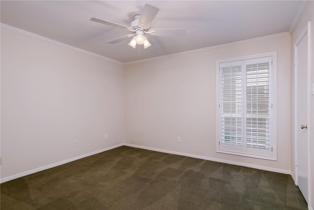 carpeted spare room featuring ceiling fan and crown molding