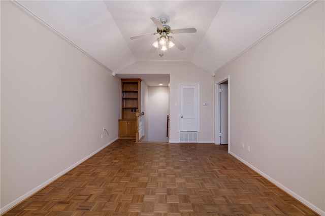 bonus room featuring parquet flooring, ceiling fan, and lofted ceiling