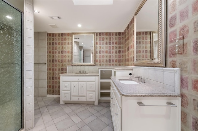 bathroom featuring vanity, tile patterned floors, crown molding, tile walls, and an enclosed shower