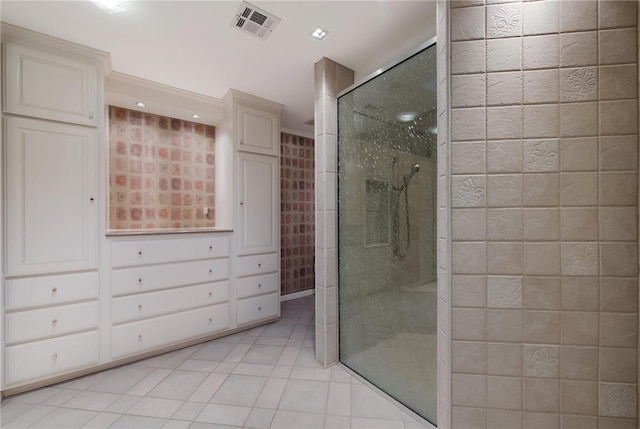 bathroom featuring tile patterned flooring and walk in shower