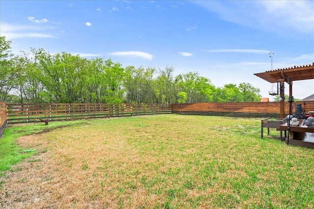 view of yard featuring fence