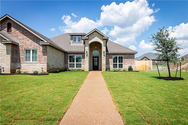 view of front of house with a front lawn