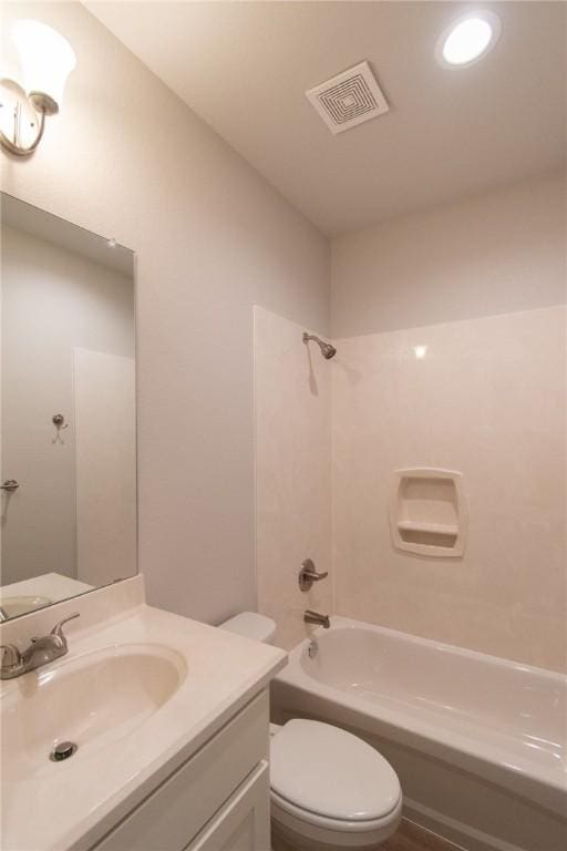 full bathroom with toilet, washtub / shower combination, and vanity