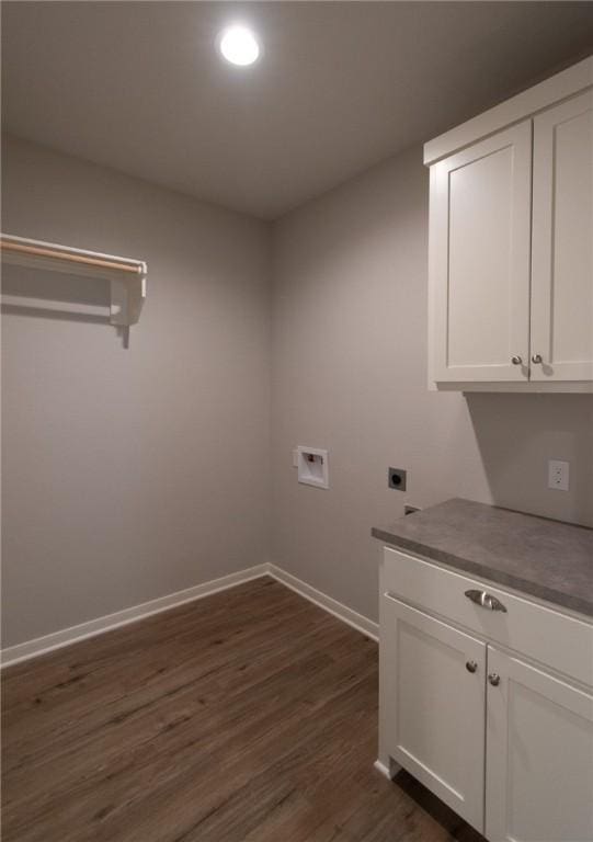 laundry area featuring cabinets, washer hookup, dark hardwood / wood-style flooring, and electric dryer hookup