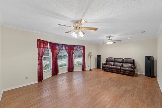 living room featuring hardwood / wood-style floors and ornamental molding