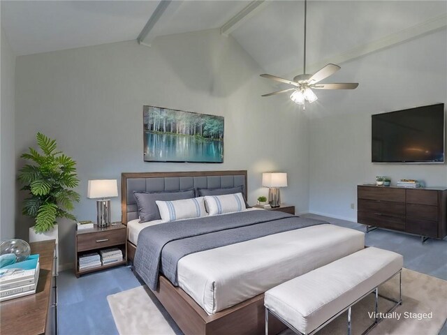 unfurnished bedroom with ceiling fan, light colored carpet, and multiple closets