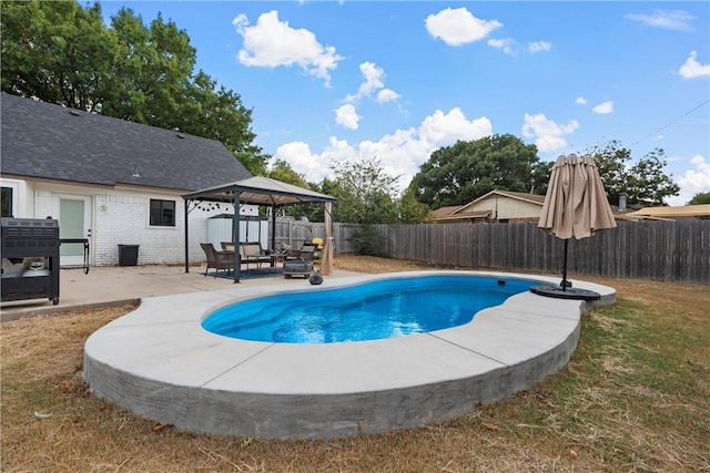 view of pool featuring a gazebo and a patio area