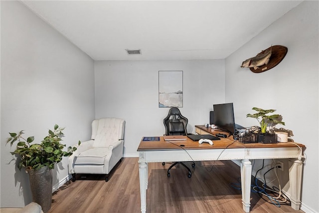 home office featuring hardwood / wood-style floors