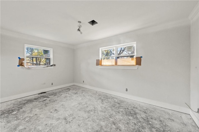 unfurnished room featuring ornamental molding