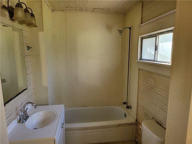 full bathroom featuring vanity, toilet, and shower / bathtub combination