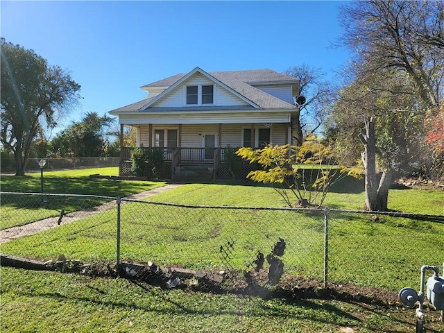 view of front of home featuring covered porch and a front lawn