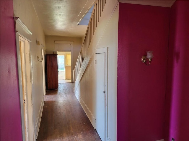 hall with dark hardwood / wood-style floors