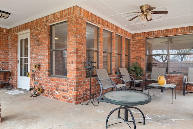 view of patio with ceiling fan