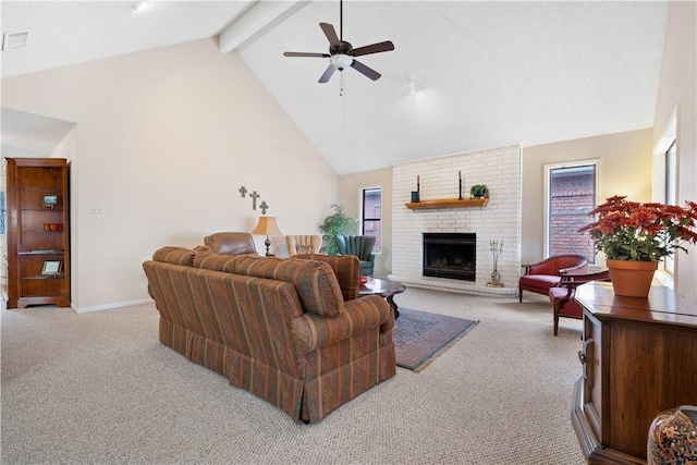 carpeted living room with beam ceiling, a fireplace, high vaulted ceiling, and ceiling fan