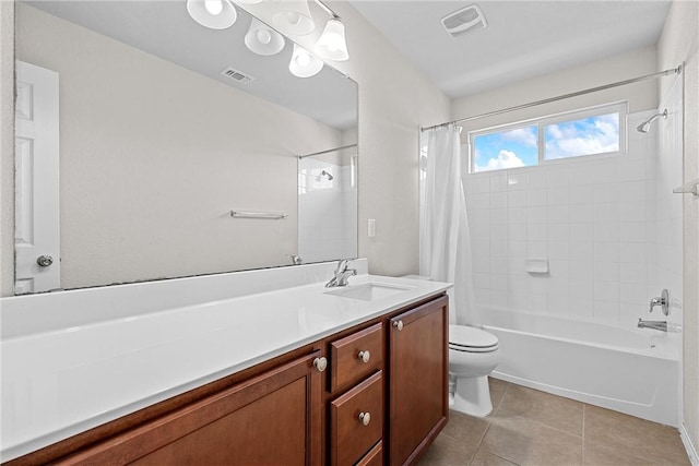 full bathroom with tile patterned floors, vanity, shower / bath combination with curtain, and toilet