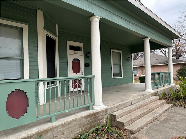 doorway to property featuring a porch