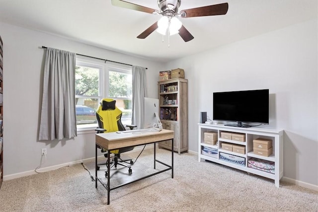 office space with light colored carpet and ceiling fan