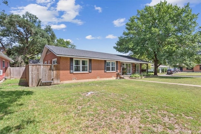 single story home with a front yard