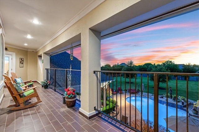 view of balcony at dusk